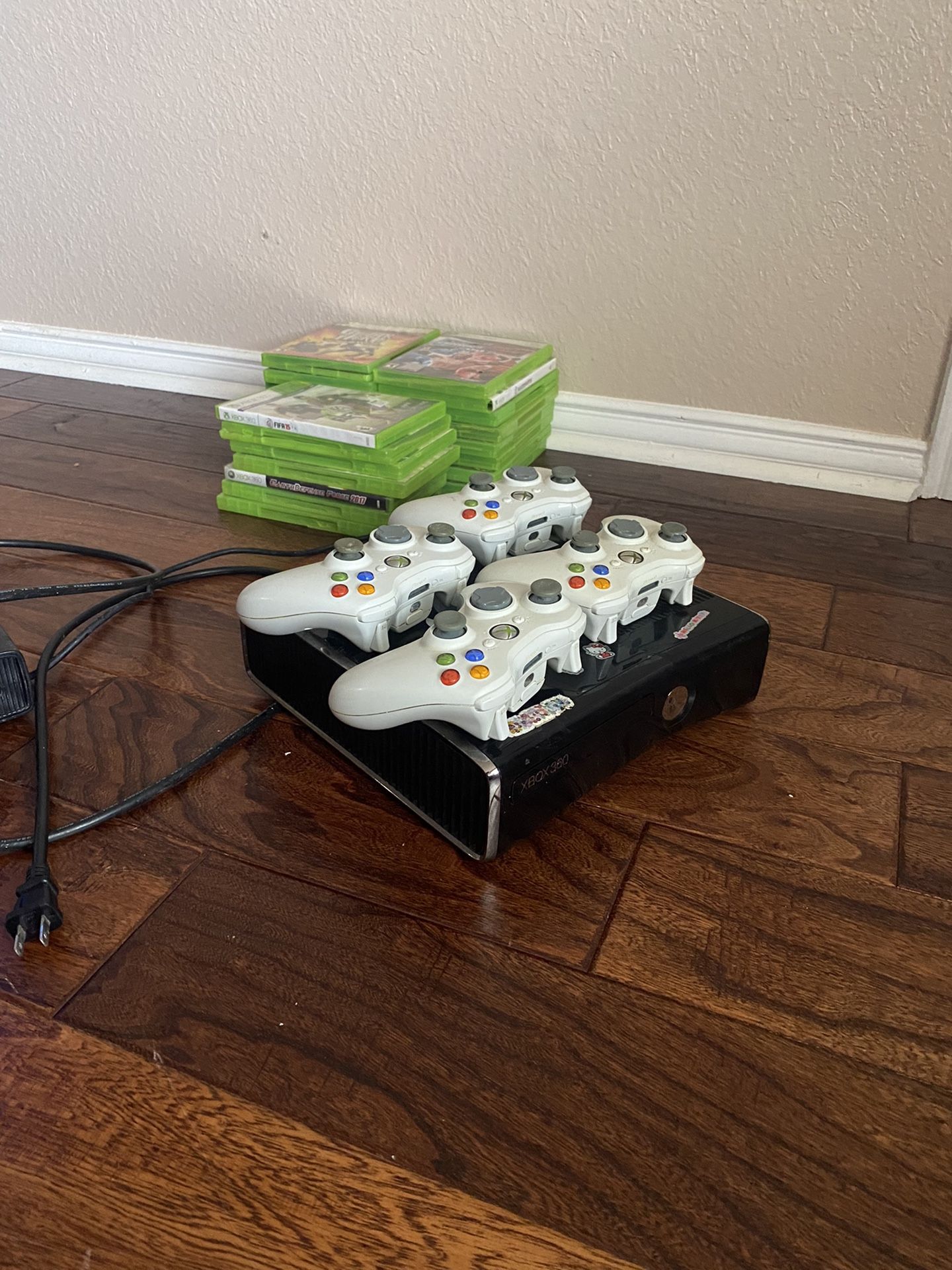 Xbox 360 Slim Console, With 20 Games And 4 Controller