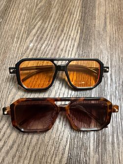2 Sunglasses - one black one brown