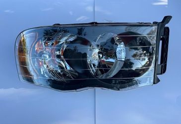 02-05 Dodge Ram Right Side/ Passenger Side Single Headlight; Black Housing With Amber Corners