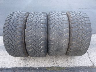 (4) 35x12.50R20 Toyo Open Country M/T Tires