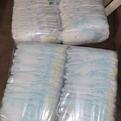 2 Packs Of Newborn Diapers