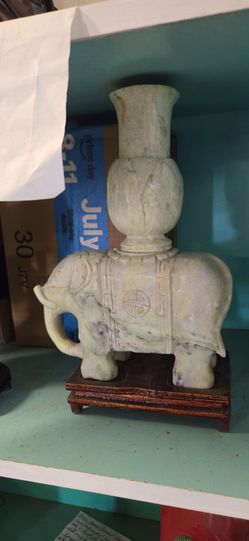 Vintage jade green elephant with vase