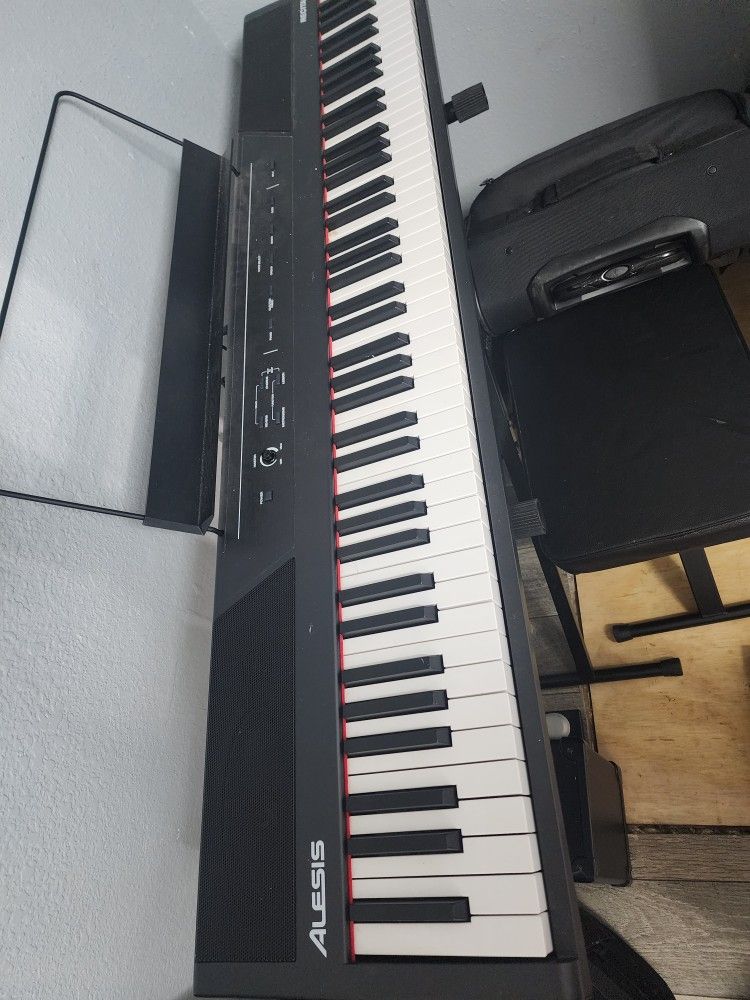 Alesis piano with chair