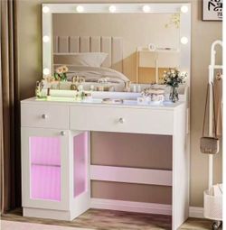 Vanity Desk with Large Mirror and Lights, 39.4" Glass Top Makeup Vanity with RGB Cabinet Drawers Power Outlet 3 Color Light Modes Brightness Adjustabl