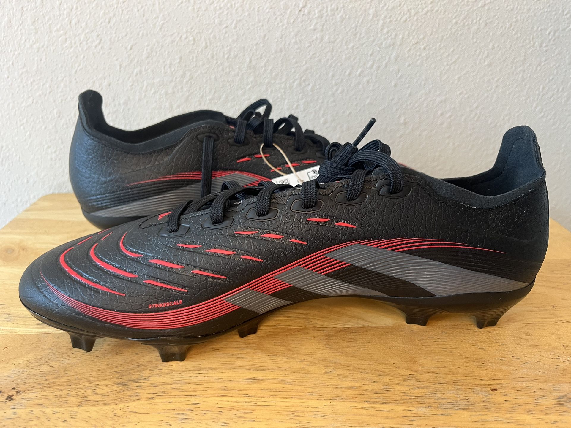 Adidas Predator League black and Red Ground cleats. Size 8 & 10 Men- 9 & 11 Women 