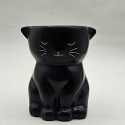 Black white ceramic meow kitty cat planter candle makeup flower vase holder home decor. There was candle inside and a little of it is still inside.  I