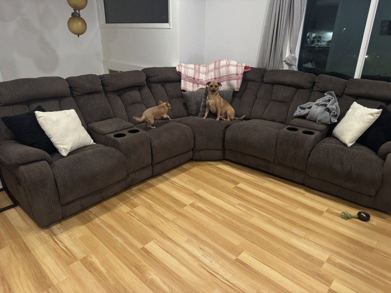 Well Used Recliner Sectional With Cupholders
