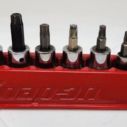 The Snap On 212EFTXY T8-T55 12 Piece 1/4"/3/8" Drive TORX Bit Standard Socket Set is a high-quality hand tool set