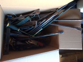 Box of Assorted tools crowbar and pry bar