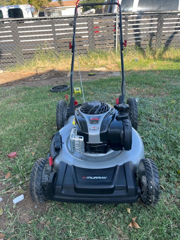 Murray
21 in. 140 cc Briggs and Stratton Walk Behind Gas Push Lawn Mower with Height Adjustment and Prime 'N Pull Start