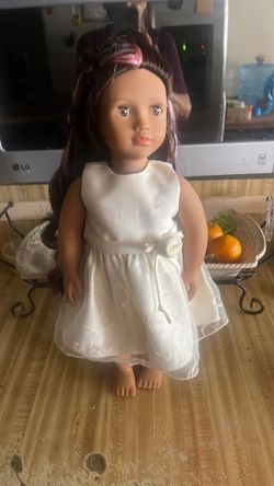 Muñeca semi nueva 18doll