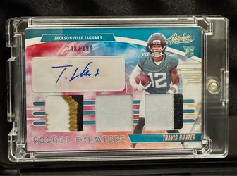 Travis Hunter Rookie Triple Memorabilia Auto /399 Jaguars