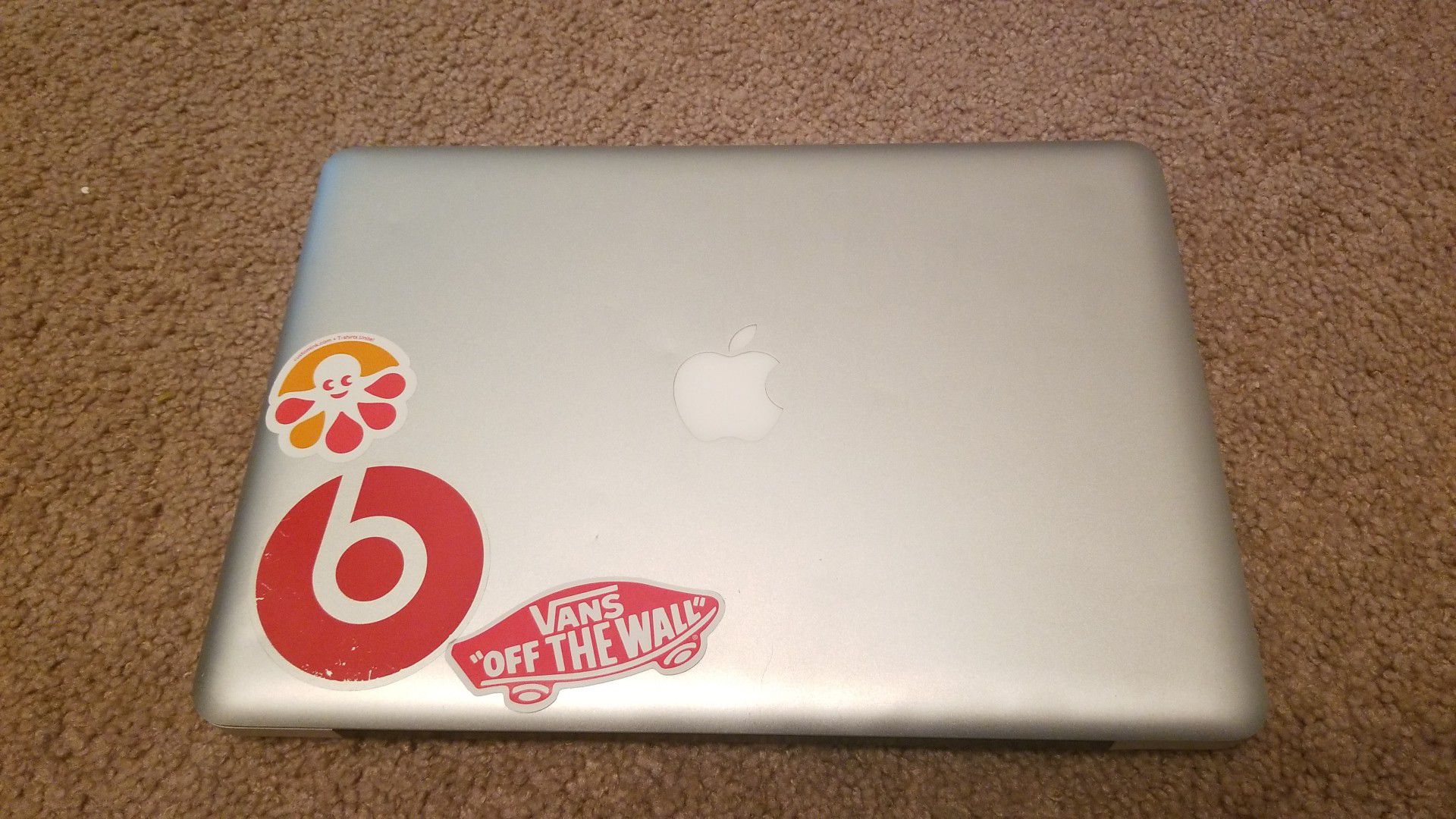 Macbook pro, used has one dent but in great condition, 2010, 13 inches. Has DVD room.