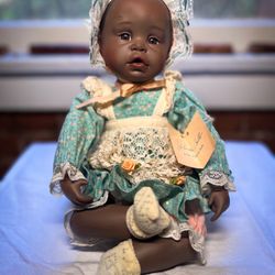 Vintage porcelain doll by artist Yolanda Bello.