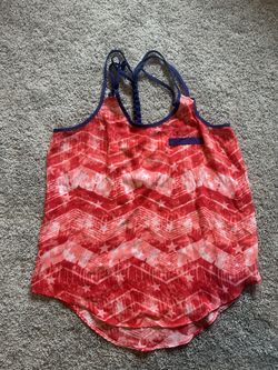 red and white geometric star print tank top