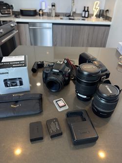 Canon EOS Rebel SL1 DSLR Bundle - 3 Lenses, Flash, Mic, 2 Batteries
