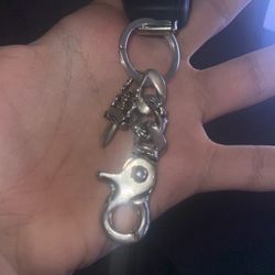 Chrome keychain with dagger