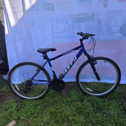 Rock Creek mountain bike, typically featuring 18-speed gears and 26-inch wheels.