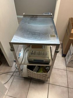 18. Metal Utility Cart with Equipment — $45  