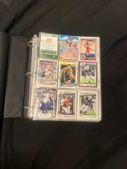 Binder of sports cards 300-400 including the binder