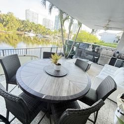 Outdoor Round Table With figure In The Middle.