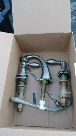 Wide spread faucet good condition