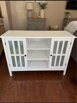White Wood Cabinet with Glass Panel Doors