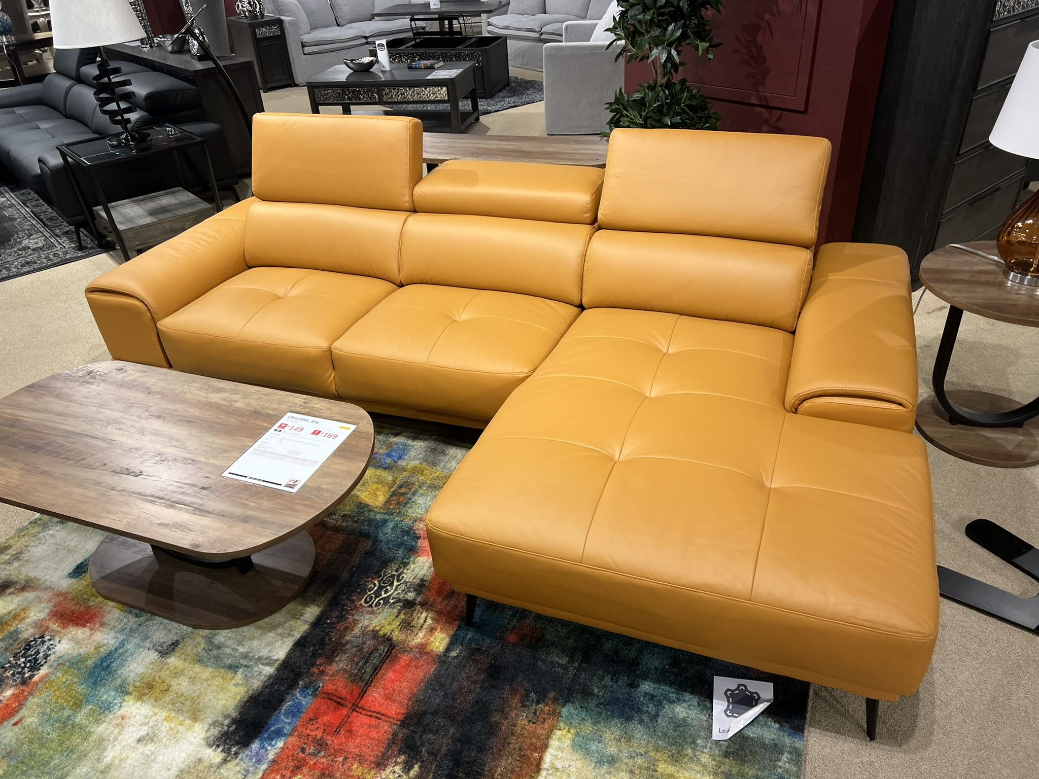 New Sectional W Adjustable Headrests.  Leather Match.  Tangerine 🍊 Or Grey.  110x68Dx29H.  Free Delivery!