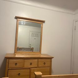 2 solid oak twin beds with dresser. Beds can be turned into bunk beds. Ladder and rails included