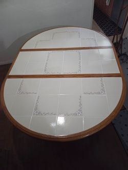 Round table with five chairs.