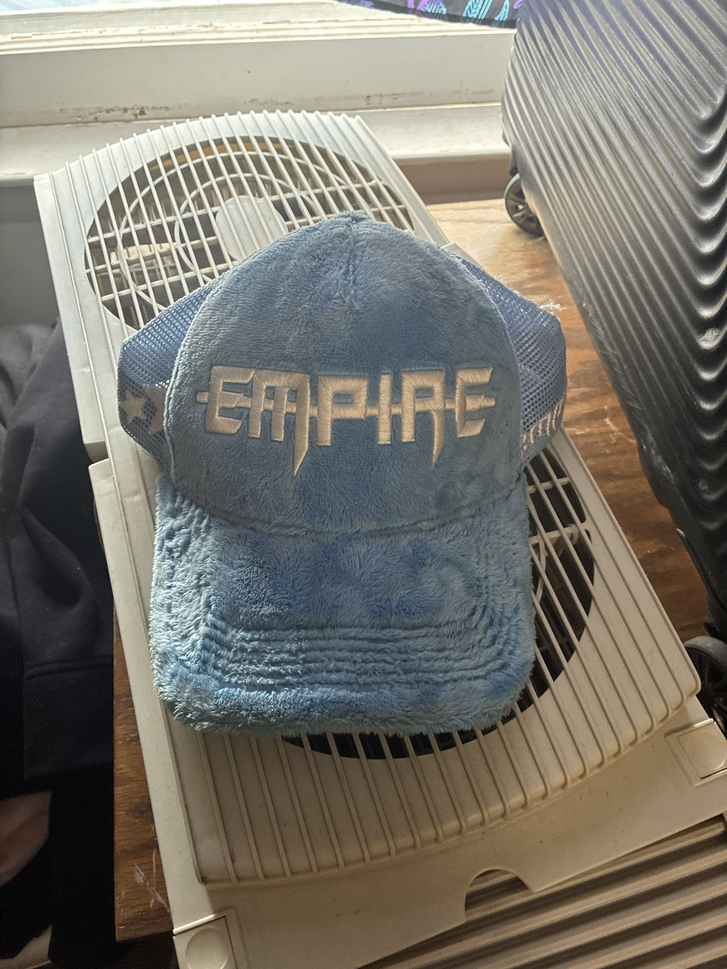 empire fuzzy cloud blue trucker hat