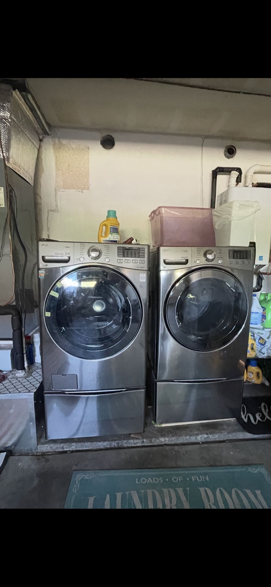 LG Washer And Electric Dryer With Pedestals
