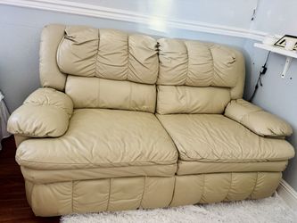Beige Leather Reclining Loveseat