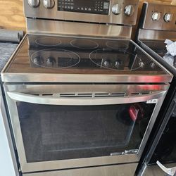 LG STAINLESS STEEL GLASSTOP STOVE CONVECTION OVEN.....$ 400