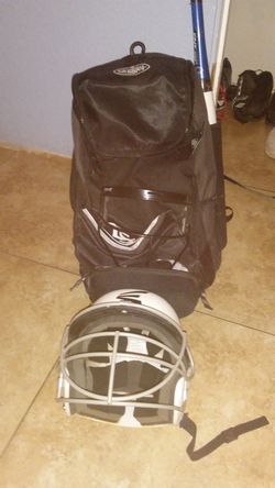 Softball bat,batting helmet,facemask, Louisville Slugger bag