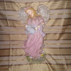 Angel Holding A Water Pot