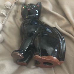 Black Cat Figuring With Green Eyes