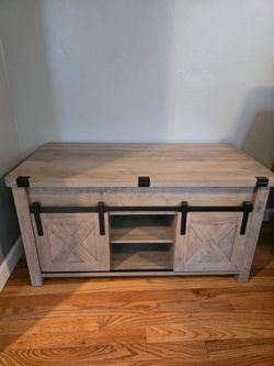 Coffee table with small chip opens up.