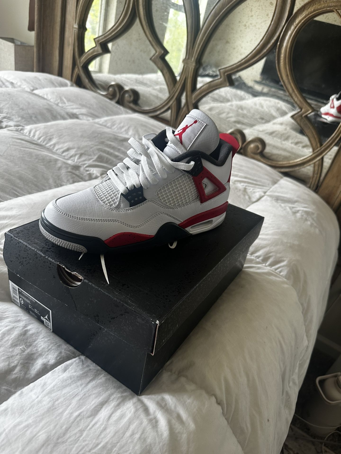 Jordan 4 Red Cement