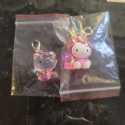 Two hello kitty charms