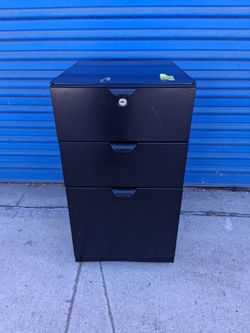 Metal file cabinet  $ 70 each