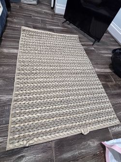Woven rug- clean and in good shape