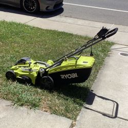 RYOBI electric lawnmower used couple of time 99% of new wash perfect excellent condition