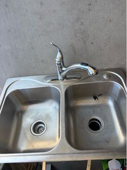 Sink with garbage disposal