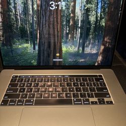 MacBook Pro 2019 i7 (16-inch)  w/ Touch Bar 16GB, 512 SSD Excellent condition  Charger included 