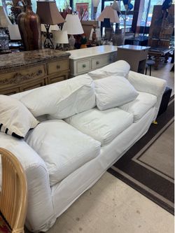 White slipcovered roll-arm style Sofa - 86”