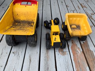 Tonga road grader like new. Lg Tonga dump truck. Plastic dump truck. Make offer