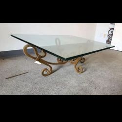 Vintage glass top coffee table with iron legs 