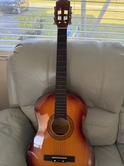D. Calata Guitara Acoustic 