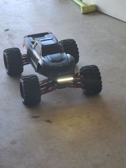Trade for 2 push mowers .....4s traxxas Max in good condition this truck is a beast trust me..